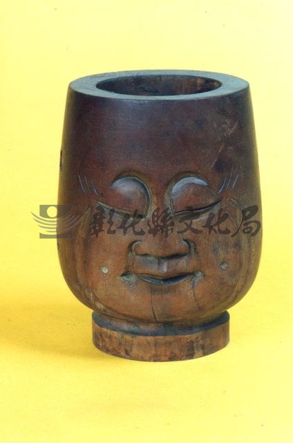 作品(雕木人頭像)的圖檔，共1張