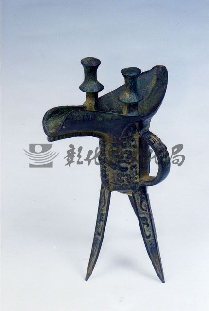 作品(仿商代饕餮紋平底爵)的圖檔，共1張